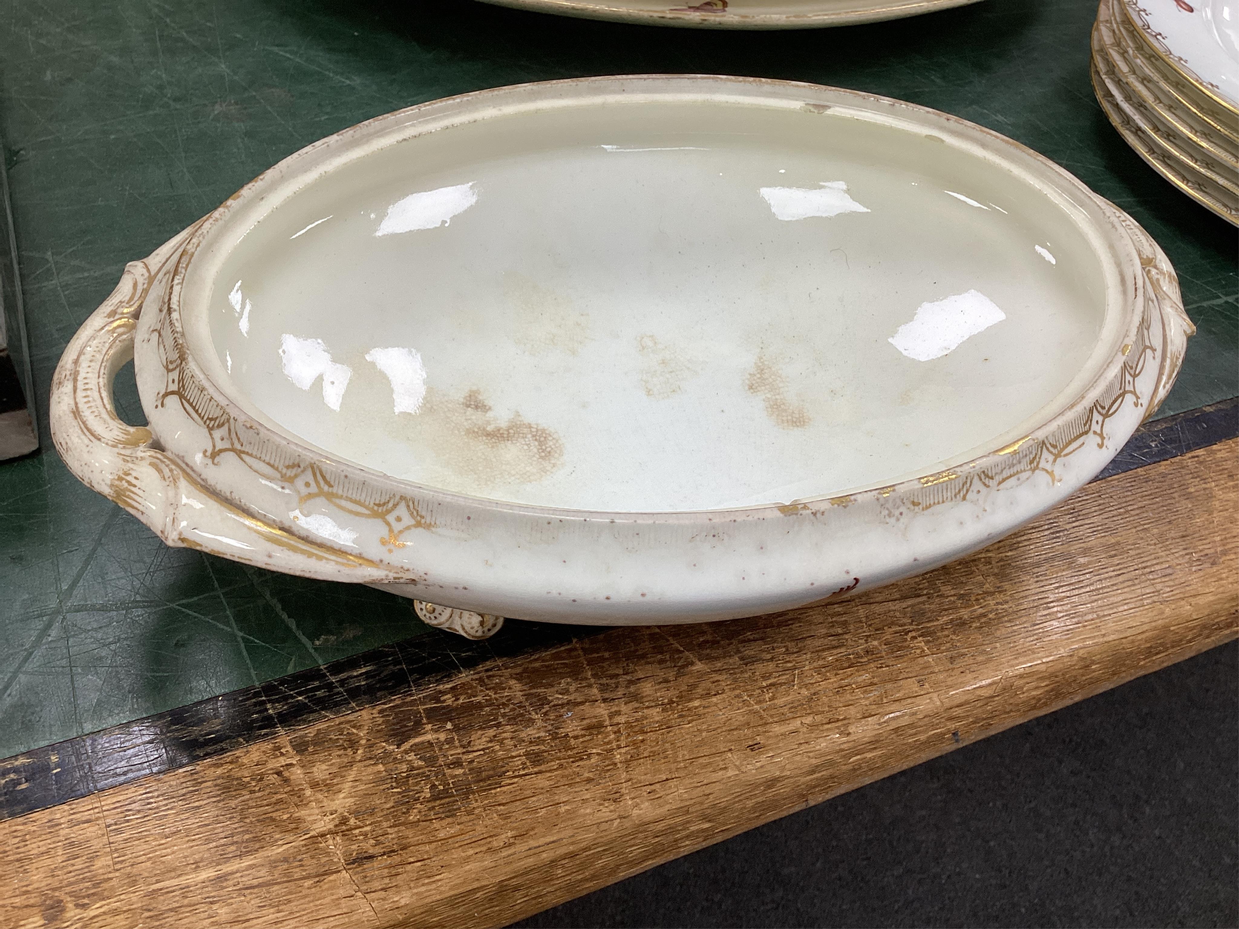 A Coalport bird painted part dinner service, mid 19th century